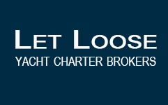 Let Loose Yacht Charter Brokers Logo. A logo on a dark blue background that reads, Let Loose in large white text above the smaller white text, YACHT CHARTER BROKERS